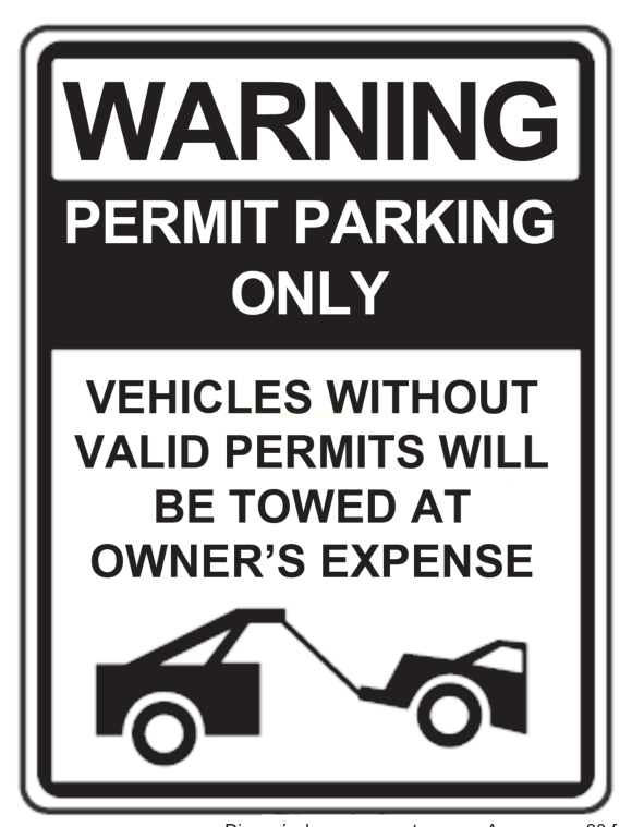 Placa de aviso em inglês sobre estacionamento permitido apenas para autorizados, com veículos rebocados às custas do proprietário.